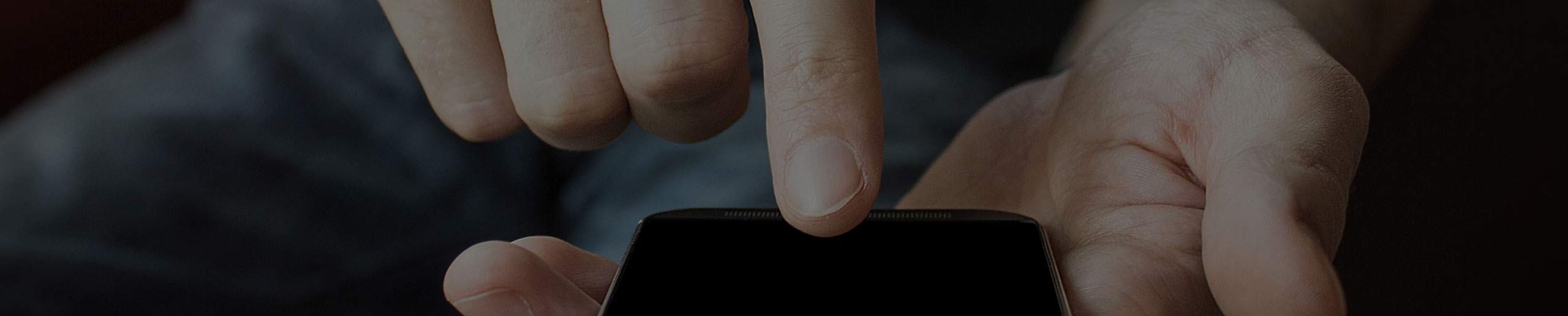 A person touching their phone screen